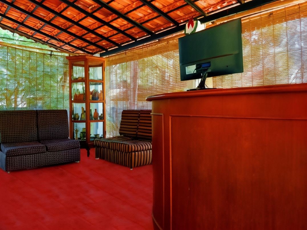 Reception and lounge area with wooden ceiling
